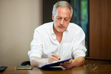 Businessman at work in his office