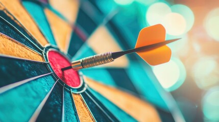 A dart successfully lands in the bullseye of a colorful dartboard, showcasing skill and precision during an engaging game