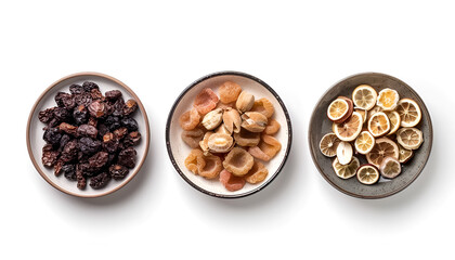 Plates with different dried fruits on white background