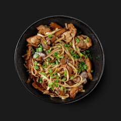 Traditional Asian dish seafood salad, rice, wok, top view, dark background