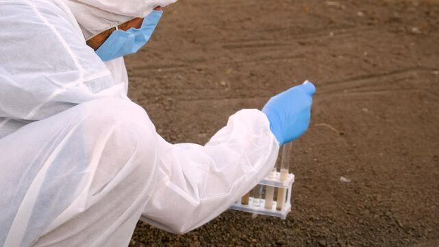 Taking soil samples in nature. Selective focus.
