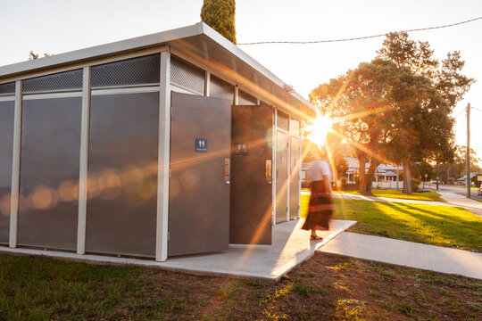 Light flare over doors of public toilet facilities in park
