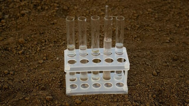 Taking soil samples in nature. Selective focus.