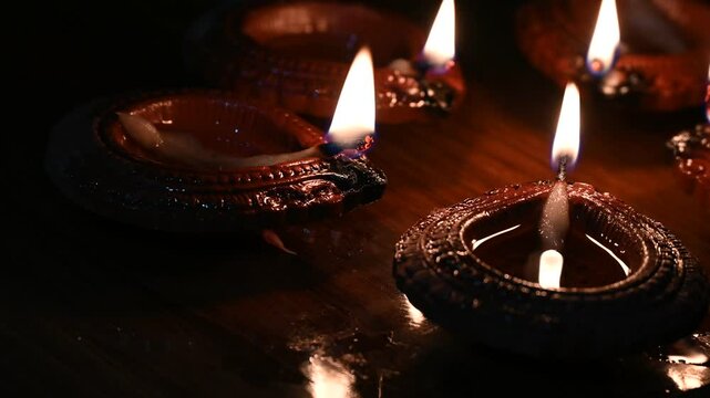 Happy Diwali - Beautiful diwali diya lamps lit during diwali celebration. Indian festival diwali