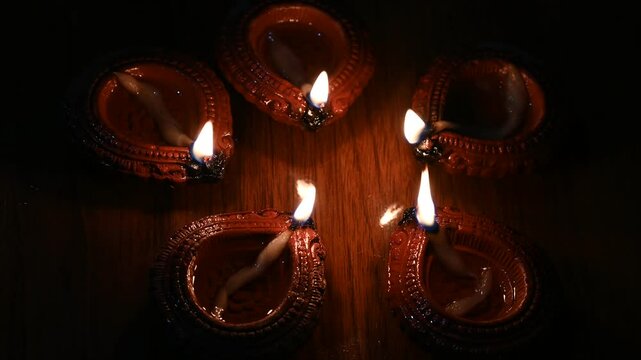 Happy Diwali - Beautiful diwali diya lamps lit during diwali celebration. Indian festival diwali