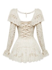 Obraz premium Back View of Off-White Lace Dress with Ruffles and a Tie Back