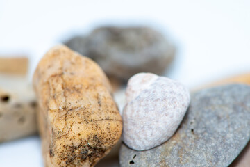 Macro Photo of Pebble Stones on White Background