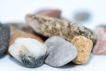 Macro Photo of Pebble Stones on White Background