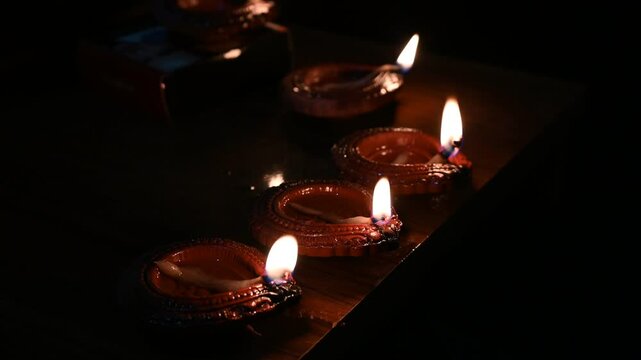 Happy Diwali - Beautiful diwali diya lamps lit during diwali celebration. Indian festival diwali