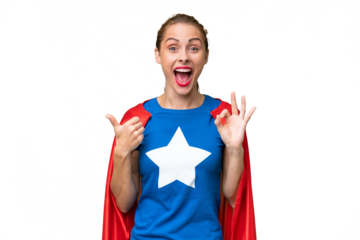 Super Hero caucasian woman over isolated background showing ok sign and thumb up gesture