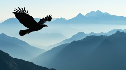 Fototapeta premium Silhouette of an eagle soaring above a mountain range with space for copy in the open sky.