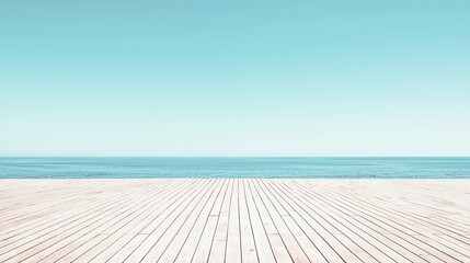 A serene beach scene featuring a wooden deck against a calm sea under a clear blue sky, perfect for relaxation and inspiration.