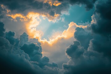 Dramatic cloudy sky with sunlight bursting through