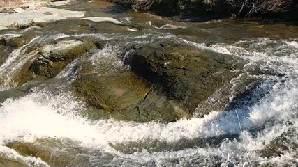 water rushing on a rocky bed, fa01