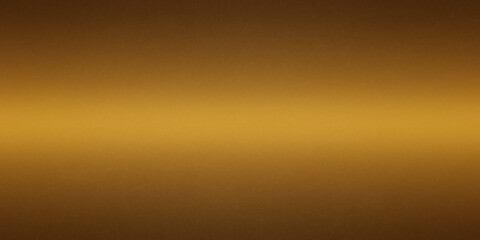 Shiny gold polished metal background texture of brushed stainless steel plate with the reflection of golden light