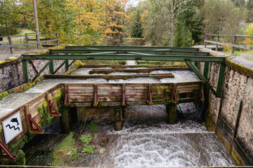 Fototapeta premium Fish pass or salmon ladder. man made fish ladder in the streaming water 