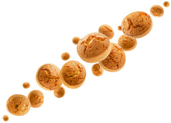 Curd cookies with candied fruits fly in space forming a chain shape. Volumetric backlight. Isolated on white.