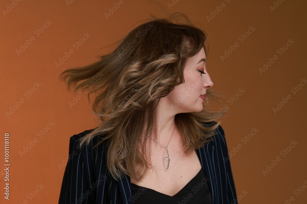 Canvas Prints Attractive woman with stylish haircut on brown background