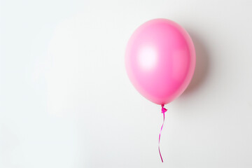Floating pink balloon on white background, minimalistic design, celebration, party decor, simple joy concept