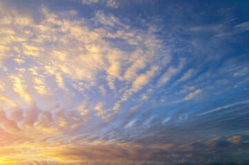 Sunset sky clouds with real sun beams, natural sunset sky background