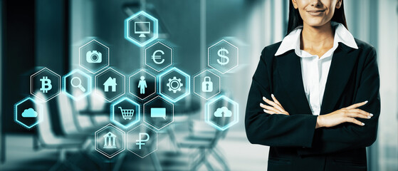 Businesswoman with digital icons representing financial and technology concepts.