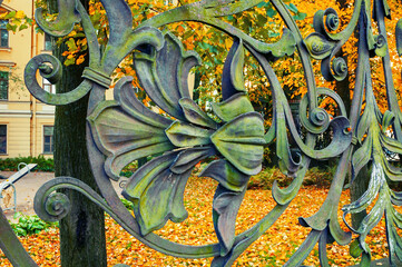 St Petersburg Russia. Architecture metal elements in form of flowers and leaves at art metal fence...