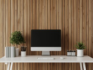 Modern workspace with a computer, plants, and wooden wall background.
