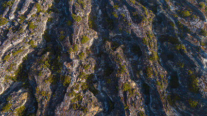 Aerial view of the volcano rock textures, hardened volcanic rock in a dramatic landscape of Ijen Volcano National Park, Indonesia