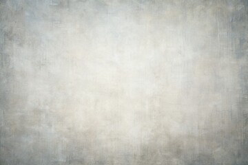 Obraz premium A neutral grey plain background texture with subtle gradient, providing a clean and minimalist canvas for creative compositions and product photography.