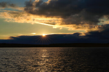 Dramatic Sunset Over Calm Waters