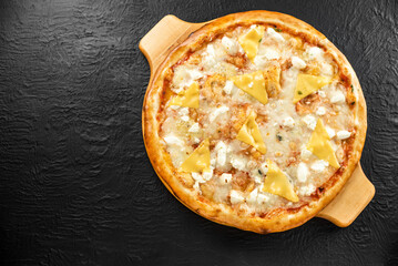 Freshly Baked Gourmet White Pizza with Cheese, Pineapple, Cashews, and Basil
