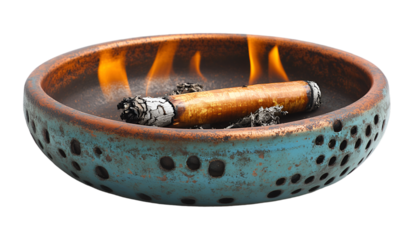 a cigarette burning in a bowl. 