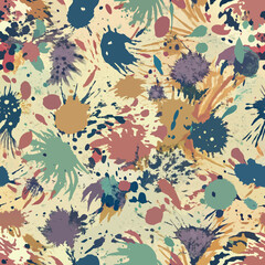 A colorful pattern with paint splatters