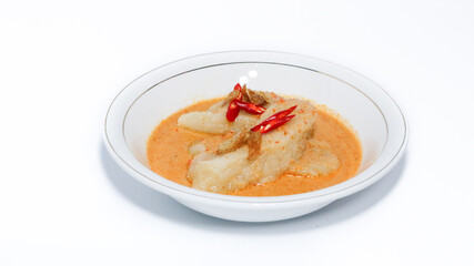 Laksan, a typical food from the city of Palembang (South Sumatra) in Indonesia. Consists of sliced ​​fish cakes served in coconut milk-shrimp sauce, sprinkled with fried shallots.