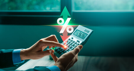 Variable Interest Rates, Business Professional Analyzing Fluctuating Interest Rates Using a...