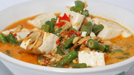 Tumis kacang panjang or stir fried long bean and tofu known as simple asian dish with light and savoury taste.