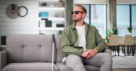 Person With Blindness Disability Sitting