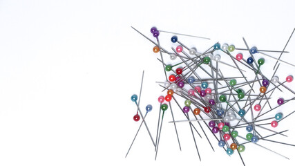 Blurred straight pin. It is made of stainless with a pointed end. Pins are usually used to hook between fabrics.