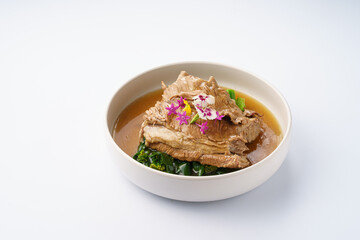 Delicious Pork Dish with Greens and Edible Flowers
