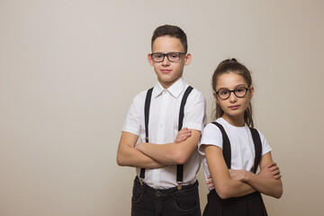 Two schoolchildren with glasses