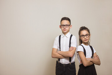 Two schoolchildren with glasses