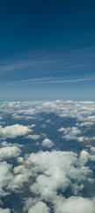 Puffy clouds with blue sky for background view from airplane
