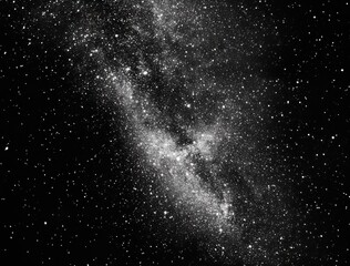 Obraz premium Black background with stars. White particles of space dust floating in the air