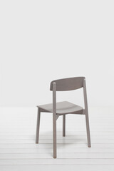 modern grey design chair with backrest in apartment interior