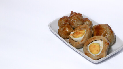 Pentol is a typical Indonesian spicy snack made from beef and tapioca flour.