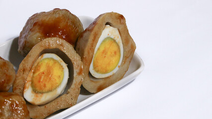 Pentol is a typical Indonesian spicy snack made from beef and tapioca flour.