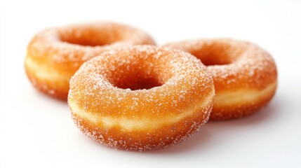 Delicious sugar-coated donuts on a white background.