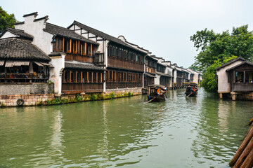 Fototapeta premium Traditional houses on the river in a traditional Chinese village