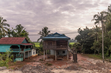 Typical small farm houses in  the Cambodian countryside