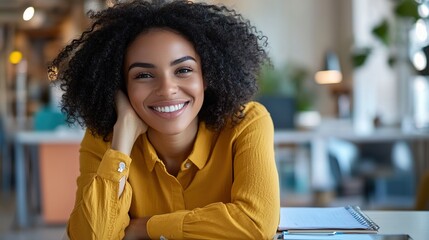 Young Woman in Yellow Shirt Leaning on Desk